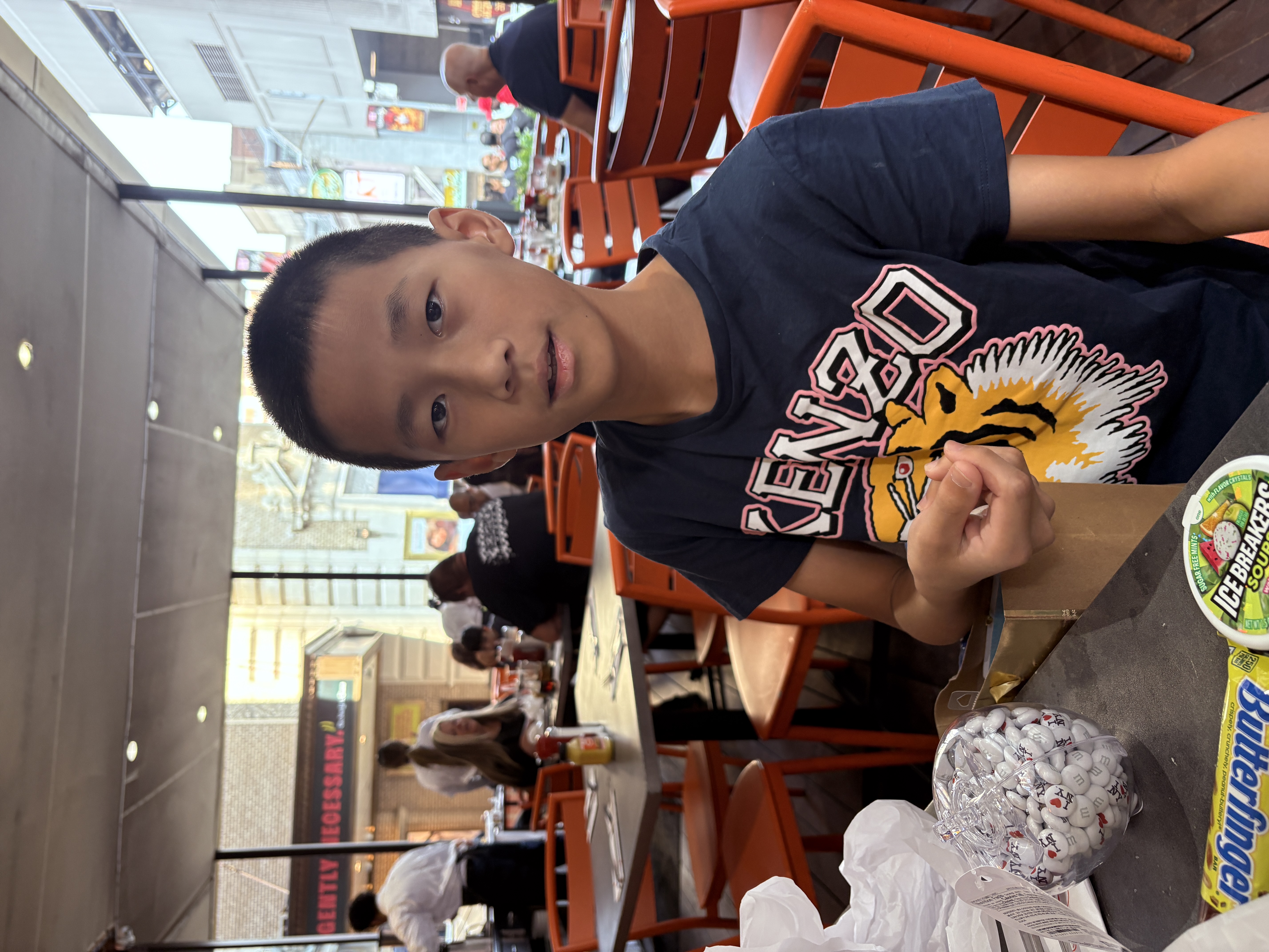 Victor opening a gift at Junior’s restaurant in New York.