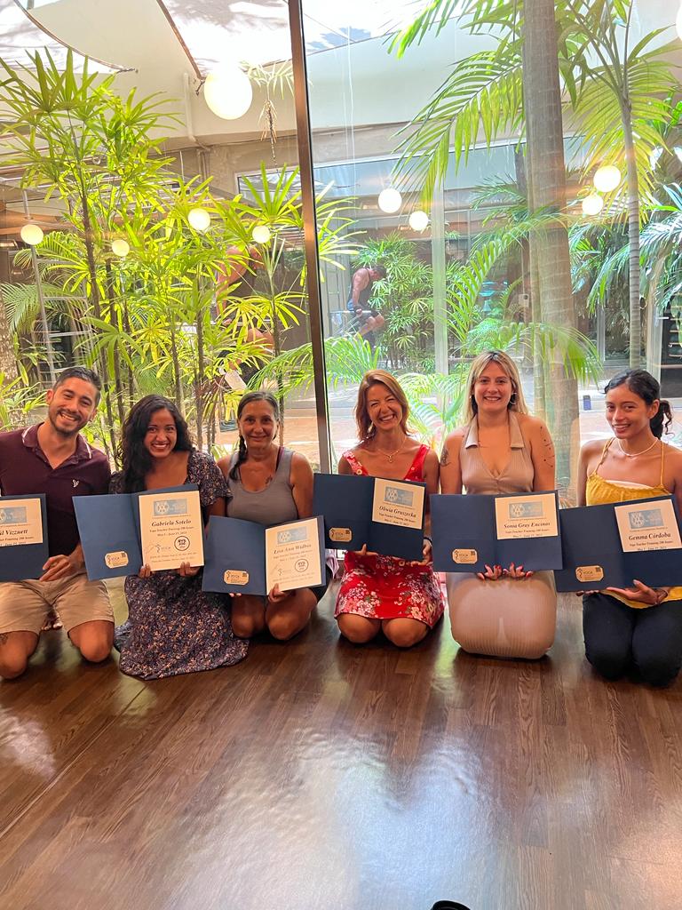 Lisa with fellow students after completing 200-hour yoga teacher training in Mexico